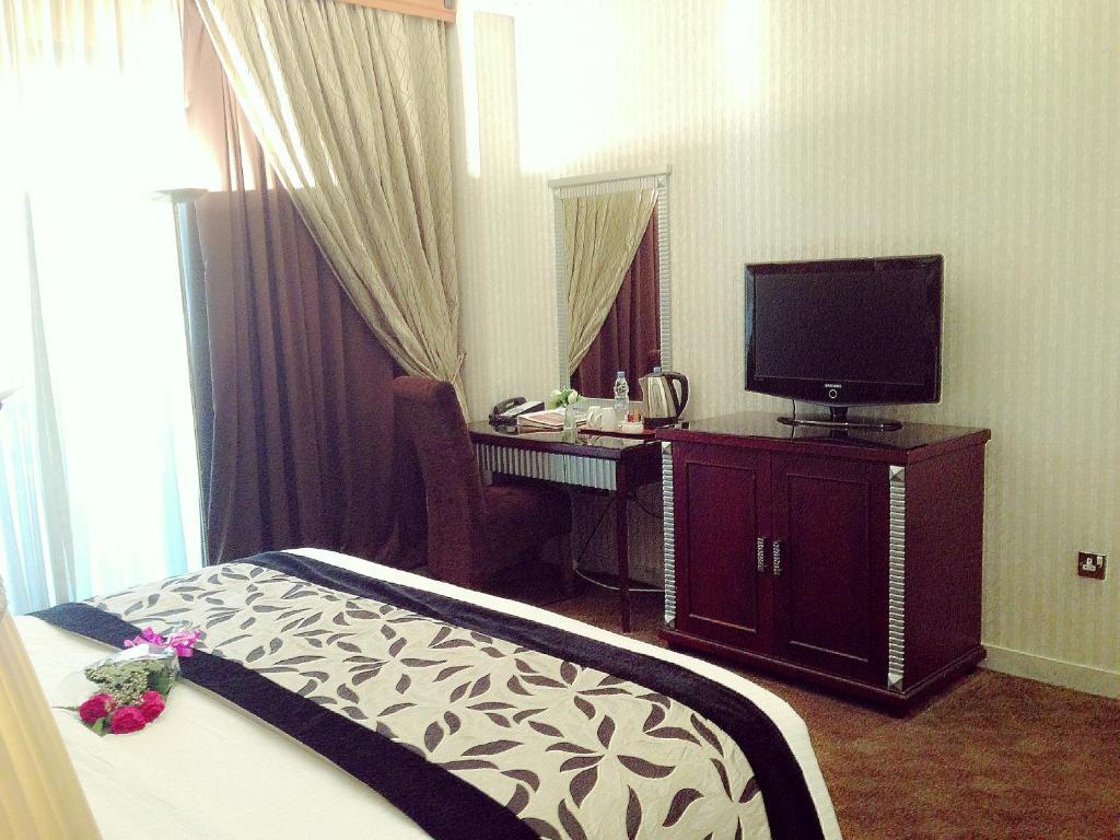 Abjad Grand Hotel Dubai Zimmer foto